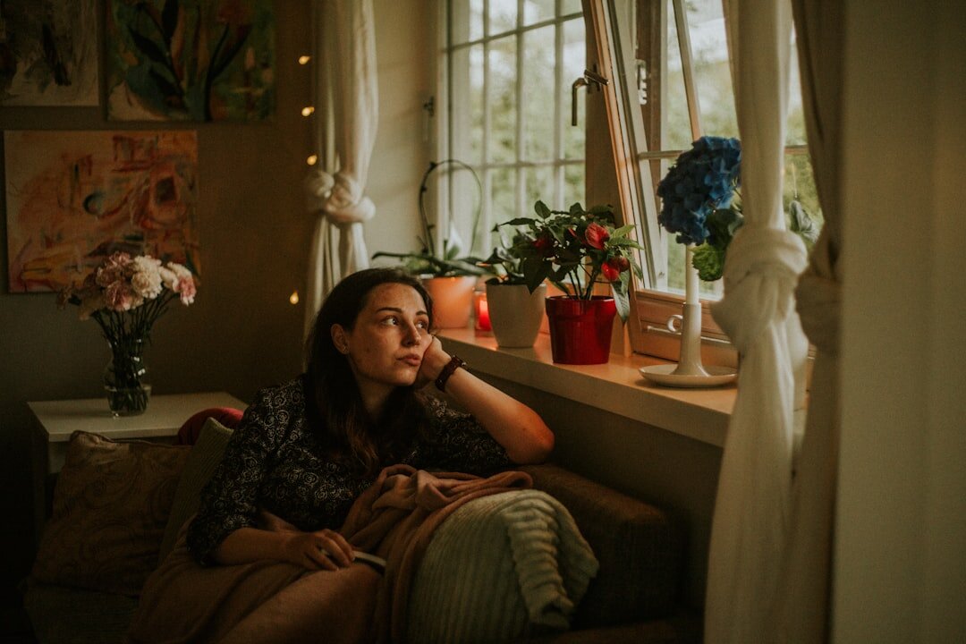 woman thinking alone at home
