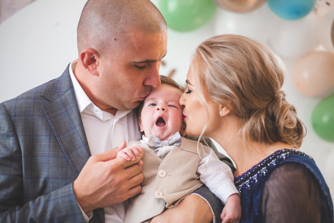 happy couple with baby